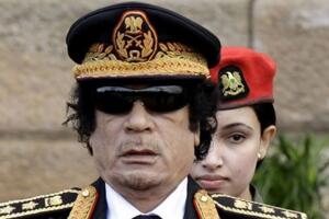 揭秘卡扎菲的美女保镖的悲惨命运，卡扎菲死前惨遭鸡奸照片曝光