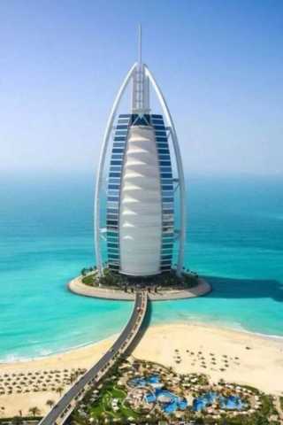 迪拜十大最疯狂的建筑，迪拜风中烛火大厦最风骚(www.gifqq.com)